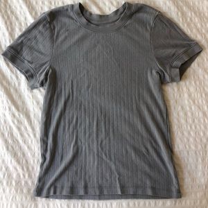 Gently used Everlane eyelet detail shirt in light blue/gray color. Size L